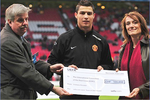 Cristiano Ronaldo presenting the ICRC with cheque for fundraising campaign on 9 April 2008 in Manchester. , http://www.icrc.org/eng/assets/images/other/682133_w2_m.jpg
