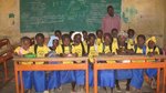 First graders in class in the village of Ingare who receive support from Lambs Support Village Girls