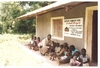 Suhog_project_jared_distributing_juice_to_the_children