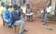 The Field Officer consulting with the community members on the formation of the Village Loans Saving scheme