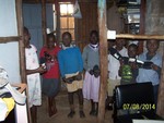 Giving Shoes to the Children in our Centre