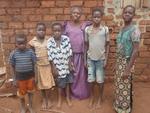 This granny can not take care of all these grand children as their parents pass was due to HIV/AIDS. they need help.
