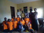 Some of the AIDs orphans with 3 guardians on the left and 2 staff on the right