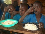our  orphans  and street  children  during  lunch at  school.